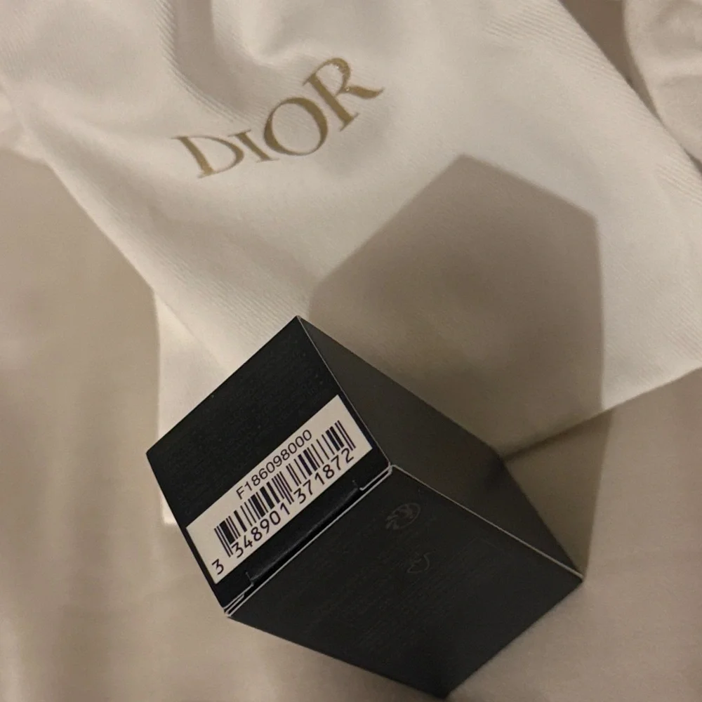 Dior SAUVAGE mini + cloth drawstring bag